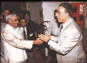 Mr. Kapoor showing samples to Mr. Vajpayee at IWS Trade Center